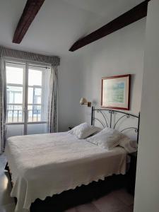 Posteľ alebo postele v izbe v ubytovaní Hotel Simon