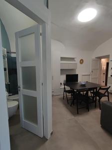 Televízia a/alebo spoločenská miestnosť v ubytovaní CASA VACANZE - ANTICO CONVENTO