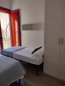 Łóżko lub łóżka w pokoju w obiekcie Centro, 3BD y 2BA, 1min Catedral, duplex de lujo