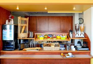 A cozinha ou cozinha compacta de ibis budget Amboise