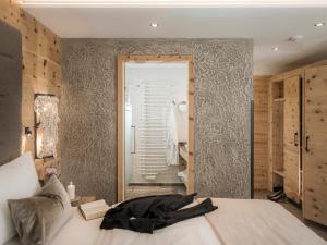 Postel nebo postele na pokoji v ubytování Hotel Bergkristall Zillertal - Adults Only