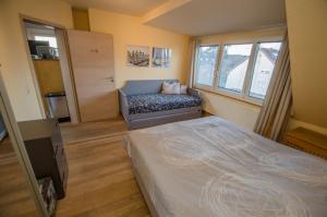 Postel nebo postele na pokoji v ubytování Ferienwohnung Cologne