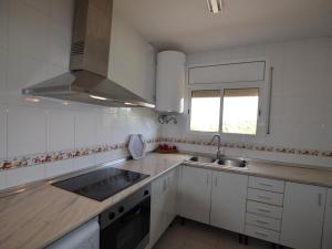 Kuchyň nebo kuchyňský kout v ubytování Villa valen montbarbat costa brava