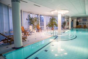 Bazén v ubytování YURA hotel Čeladná BAZÉN A SAUNY ZDARMA nebo v jeho okolí