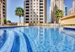 The swimming pool at or close to Waterfront Luxury 3BR with maids room in JBR, Dubai