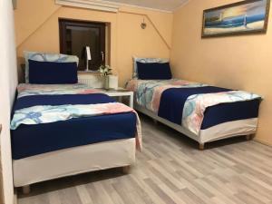 Cama o camas de una habitación en PensionLien