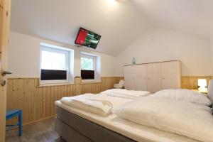 Postel nebo postele na pokoji v ubytování Haus Elisabeth Bootshaus