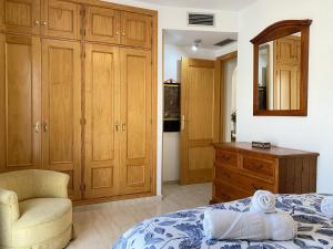 Łóżko lub łóżka w pokoju w obiekcie Penthouse Clavero Casasol