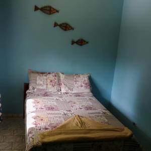 Кровать или кровати в номере Pousada do Carlito