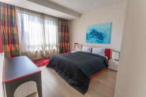 Postel nebo postele na pokoji v ubytování Armoni Residence Istanbul