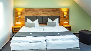 Postel nebo postele na pokoji v ubytování City-Hotel-Wolgast
