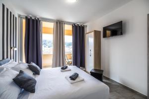 Postel nebo postele na pokoji v ubytování Apartments Sunshine Home