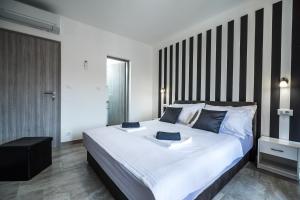 Postel nebo postele na pokoji v ubytování Apartments Sunshine Home