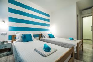 Postel nebo postele na pokoji v ubytování Apartments Sunshine Home