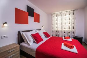 Postel nebo postele na pokoji v ubytování Apartments Sunshine Home