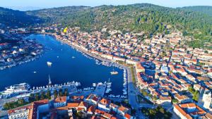 an aerial view of a city with a harbor at Apartments Sunshine Home in Vela Luka