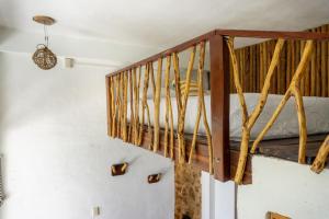 Postel nebo postele na pokoji v ubytování Xcabal Hotel boutique