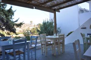 Restaurace v ubytování Vegera Apartment 'Ostria', Stavros Donoussa
