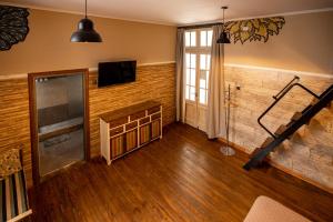 TV a/nebo společenská místnost v ubytování Che Juan Hostel BA