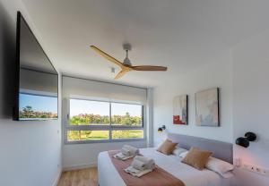 TV a/nebo společenská místnost v ubytování Homity Holidays - Playa Granada - Mar de Astrid