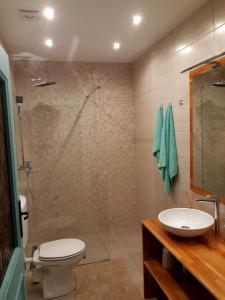 Koupelna v ubytování SočaLand Apartmaji