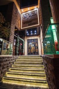 a set of stairs in front of a building at Royal Plaza Hotel in Tbilisi City