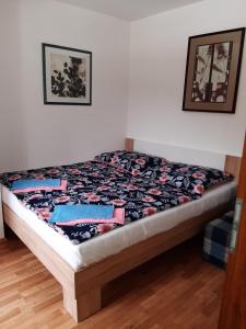 Posteľ alebo postele v izbe v ubytovaní Apartmány Rohlík