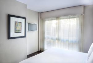Hotel Gran Derby Suites, a Small Luxury Hotel of the World客房内的一张或多张床位