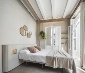 Ein Bett oder Betten in einem Zimmer der Unterkunft Apartamento centro de valencia preciosa terraza