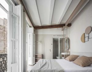 Ein Bett oder Betten in einem Zimmer der Unterkunft Apartamento centro de valencia preciosa terraza