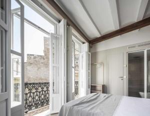 Ein Bett oder Betten in einem Zimmer der Unterkunft Apartamento centro de valencia preciosa terraza