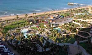 an aerial view of a resort near the beach at Tenbury Beach Apartment in Durban