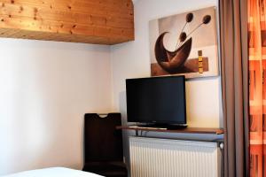 TV in/ali zabaviščno središče v nastanitvi Haus Waldner