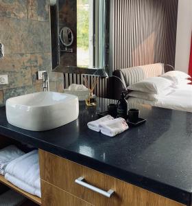Кровать или кровати в номере THE ADDRESS CASSIS