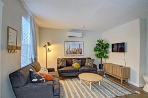 a living room with a couch and a table at 18th Street C in Boise