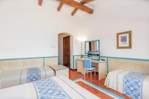 Postel nebo postele na pokoji v ubytování Il Borgo BagaBaga - Exclusive Country Retreat