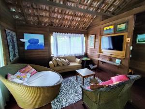 TV a/nebo společenská místnost v ubytování Linda Casa para Temporada em Manguinhos