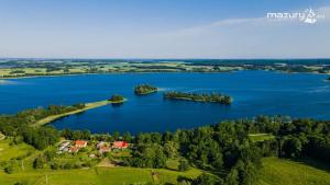 Letecký snímek ubytování Mieszkanie nad jeziorem Rydzówka+prywatny staw+plaża+Mazury