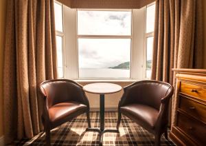 A seating area at SGE Esplanade Hotel