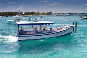 a group of people on a boat in the water at Singer Island Inn in West Palm Beach