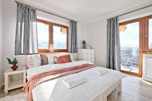 Posteľ alebo postele v izbe v ubytovaní Apartamenty Maciejka Odkryj Zakopane