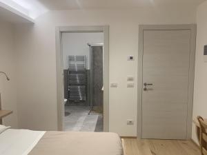 Postel nebo postele na pokoji v ubytování La locanda di Geppetto