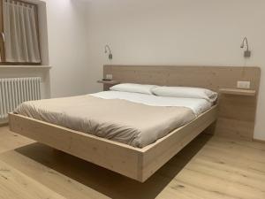 Postel nebo postele na pokoji v ubytování La locanda di Geppetto