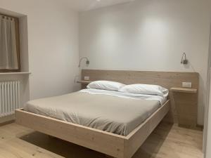 Postel nebo postele na pokoji v ubytování La locanda di Geppetto
