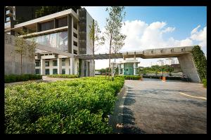 an empty parking lot in front of a building at HOMESTAY D'Univ 360 PLACE in Seri Kembangan