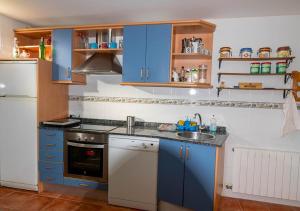 Kuchyň nebo kuchyňský kout v ubytování Villa Miguel