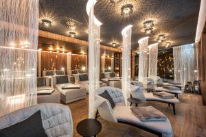A seating area at Alpin Life Resort Lürzerhof