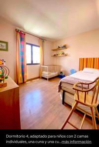 Postel nebo postele na pokoji v ubytování Villa Ágatha, vacaciones en familia en Lanzarote
