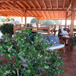 Reštaurácia alebo iné gastronomické zariadenie v ubytovaní Hostal Casa Arco Iris (Playa)