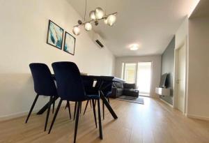 TV a/nebo společenská místnost v ubytování Style Apartment